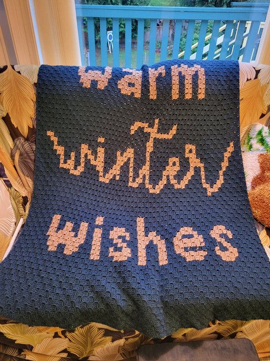Blanket that says Warm Winter Wishes