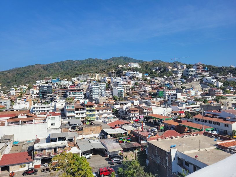 A picture of Puerto Vallarta with buildings rising up a hill